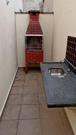 Imagem Casa tipo sobreposta baixa isolada, quintal com churrasqueira, 3 dormitórios à venda, 75 m² por R$ 480.000 - Marapé - Santos/SP