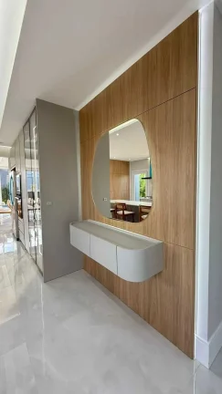 Imagem Casa em condomínio com 4 suítes e 2 vagas de garagem