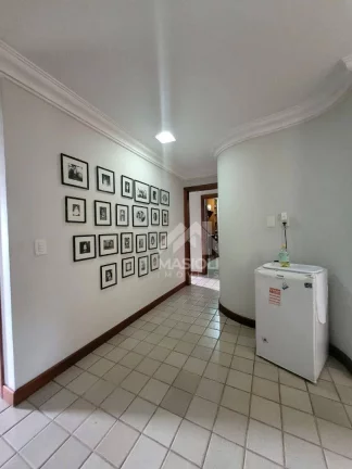 Imagem casa 4 quartos com 3 suítes, adega, piscina e área de churrasqueira.