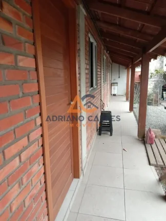 Imagem Adriano Carpes Imóveis vende terreno escritura com 2 casas no Centro de Navegantes/SC no litoral Norte de Santa Catarina