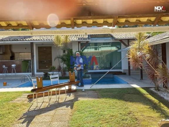 Imagem Venha viver com todo o conforto e requinte em uma casa que redefine o conceito de lar. Esta espetacu...