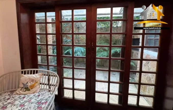 Imagem Casa à venda no condomínio Petit Village na Granja Viana - Batelli Imóveis