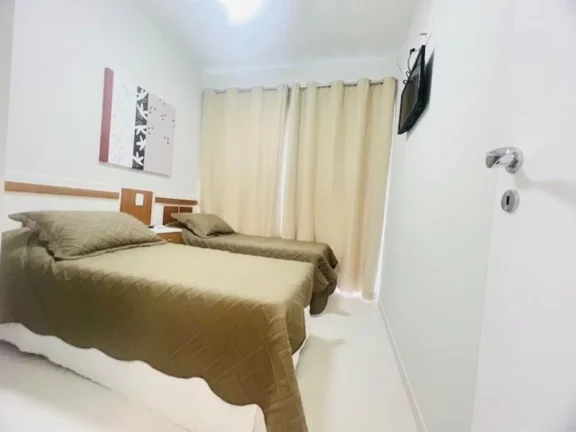 Imagem Apartamento à venda na Riviera de São Lourenço, no módulo 7: 3 quartos, 1 suíte, 2 salas, 2 vagas de garagem! Seu refúgio à beira-mar!