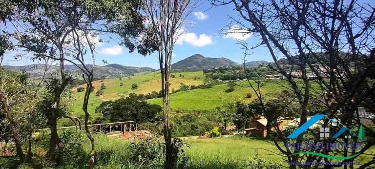 Imagem Vista espetacular e segurança: seu terreno te espera em Paraisópolis!