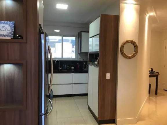 Imagem Apartamento com 3 dormitórios sendo 1 suíte e 2 vagas de garagem em Bombas, Bombinhas/SC