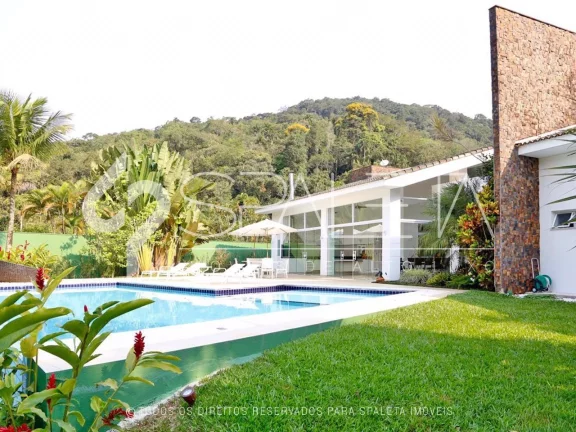 Imagem Oásis de Luxo: Casa térrea com piscina, sauna e píer privativo à venda no condomínio Marina Guarujá