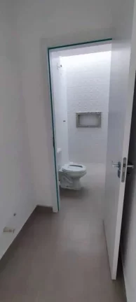 Imagem Casa com 2 Dormitórios sendo 1 suíte e 1 vaga na Garagem em Navegantes.