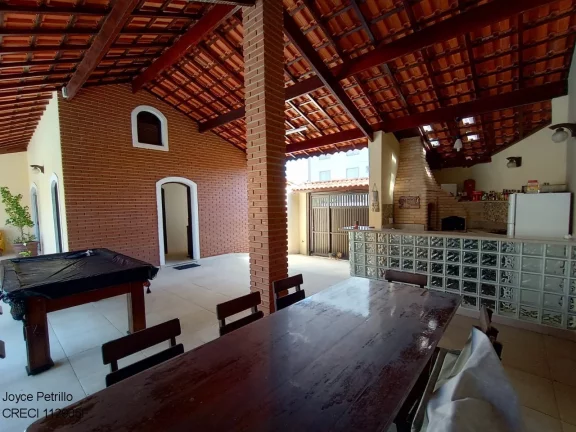 Imagem Casa á venda em Peruíbe com 4 dormitórios, piscina e ampla área de lazer a apenas 550m da praia. Aproveite!!!