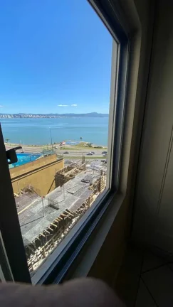 Imagem Apartamento vista mar com 1 dormitório e 1 vaga, próximo ao Beiramar Shopping em Florianópolis/SC