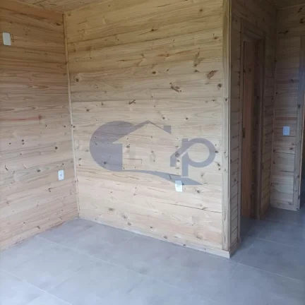 Imagem Casa a venda com 2 dormitorios no Loteamento Pedro Bez Machado em Torres/RS