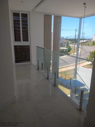 Imagem Imperdível: Casa de luxo em condomínio Alphaville (Abrantes), Camaçari-BA - 5 quartos, 4 suítes, 2 salas, 1 banheiro, 4 vagas, 267m²!