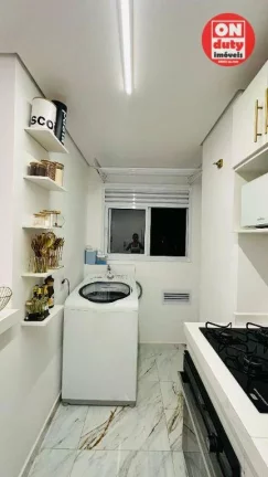Imagem Apartamento com 2 dormitórios à venda, 46 m² por R$ 340.000,00 - Areia Branca - Santos/SP