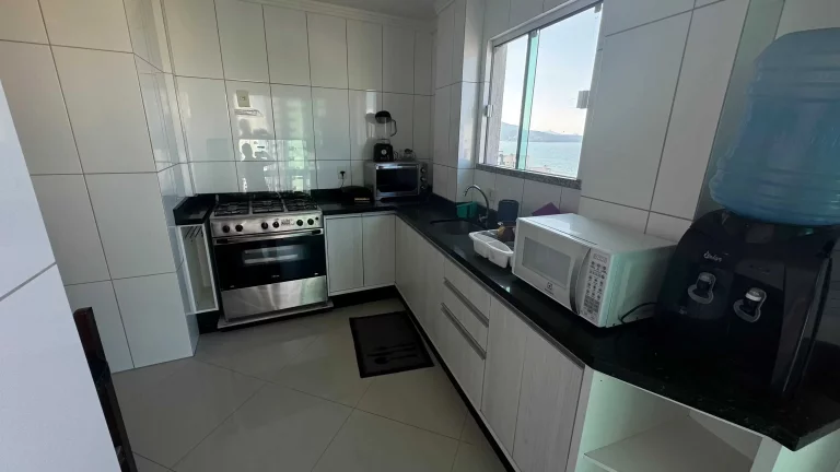 Imagem Apartamento com 3 dormitórios sendo 2 suítes e 1 vaga de garagem em Itapema/SC