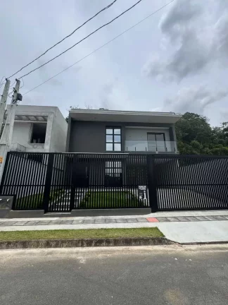 Imagem Casa com 3 dormitórios sendo 3 suítes e 2 vagas de garagem em Joinville/SC
