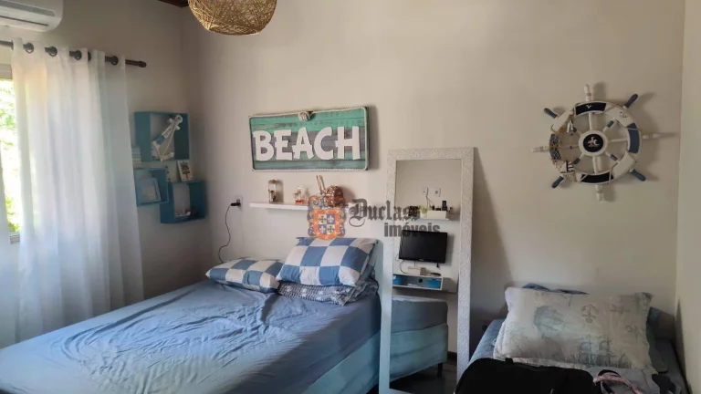 Imagem Sobrado com 2 dormitórios à venda, 71 m² por R$ 450.000,00 - Martim de Sá - Caraguatatuba/SP