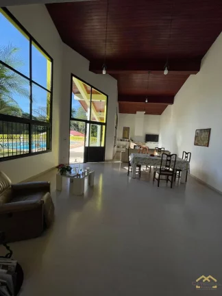 Imagem Casa térrea com 3 suítes em condomínio à venda em Jordanésia - Cajamar/SP