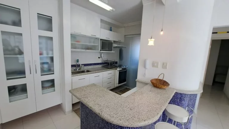 Imagem APARTAMENTO 30 METROS DA PRAIA DAS ASTÚRIAS COM 2 VAGAS PARA AUTO E LAZER
