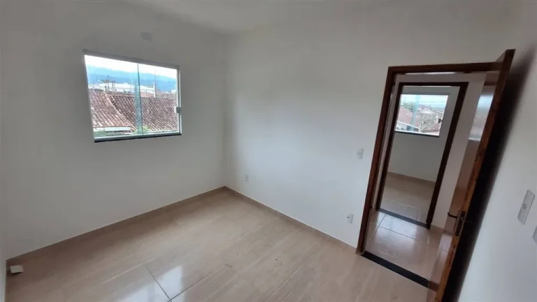 Imagem Casa 2 dormitórios com sacada a venda em Praia Grande 200metros da praia