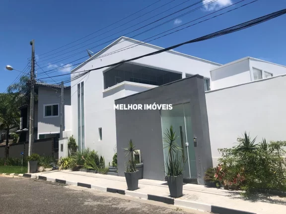 Imagem Casa Alto Padrão a venda em Condominio Fechado com 04 suítes e 03 vagas.