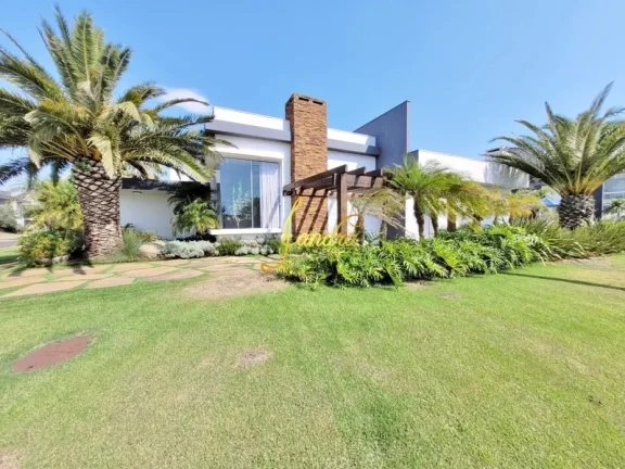 Imagem Casa térrea no Enseada com piscina aquecida e 4 suítes