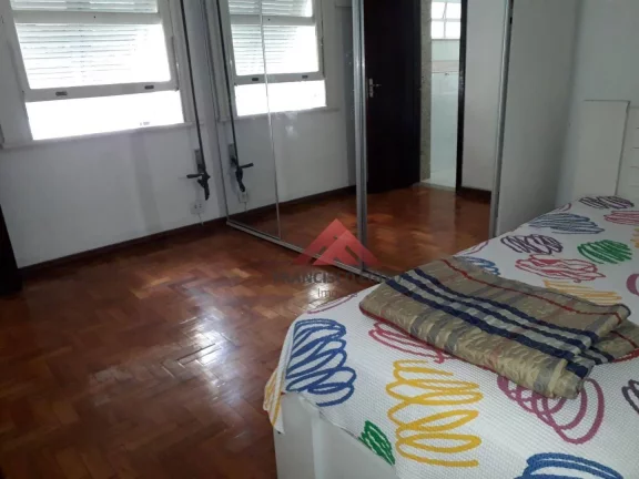 Imagem Excelente apartamento na praia de icaraí com pequena varanda lateral com vista parcial do mar,ampla sala de estar com 03 ambientes,sala de jantar,03