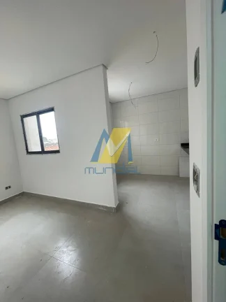 Imagem Apartamento com 2 dormitórios (1 suíte), sacada, elevador, 1 vaga. Novo