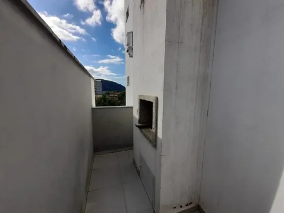 Imagem Apartamento com 1 suíte mas 1 dormitório no bairro Gravatá de Navegantes com churrasqueira a carvão e terraço a venda com Adriano Carpes Imóveis.