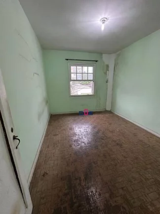 Imagem Sobrado com 2 dormitórios à venda, 98 m² por R$ 393.000 - Macuco - Santos/SP
