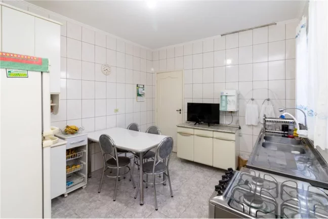 Imagem Sobrado com 5 casas e 1 galpão - Oportunidade de investimento ou moradia