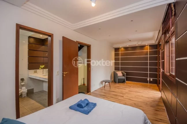 Imagem Casa em Condomínio 3 dorms à venda Avenida Vicente Monteggia, Cavalhada - Porto Alegre