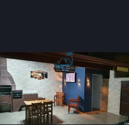 Imagem Sobrado com 4 dormitórios sendo 3 suítes e 1 banheiro social a venda no Itaguá em Ubatuba.