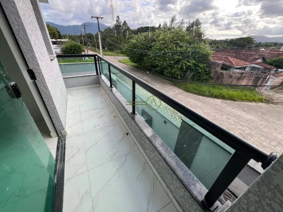 Imagem Sobrado novo a venda Cozinha planejada Suíte master com closet Peruíbe