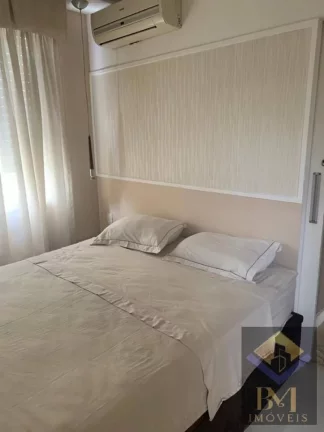 Imagem APARTAMENTO NO BOQUEIRÃO FRENTE MAR COM VARANDA E PORTEIRA F