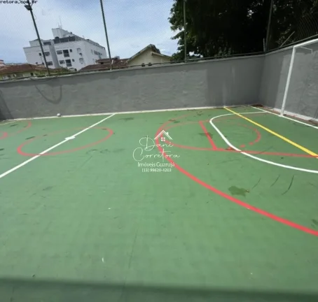 Imagem Aluguel de apartamento no Jardim Astúrias, Guarujá-SP: 2 quartos, 1 suíte, 2 salas, 2 banheiros, 1 vaga de garagem, 85m² de área.