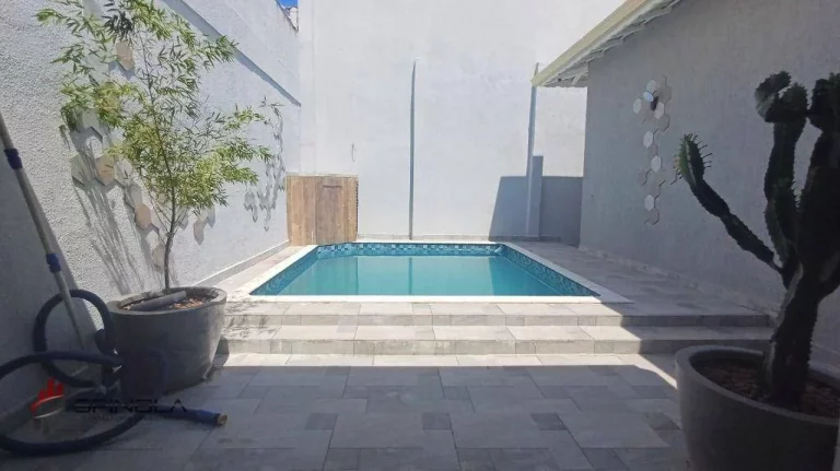 Imagem Casa com 4 dormitórios à venda, 127 m² por R$ 1.650.000,00 - Vila Caiçara - Praia Grande/SP