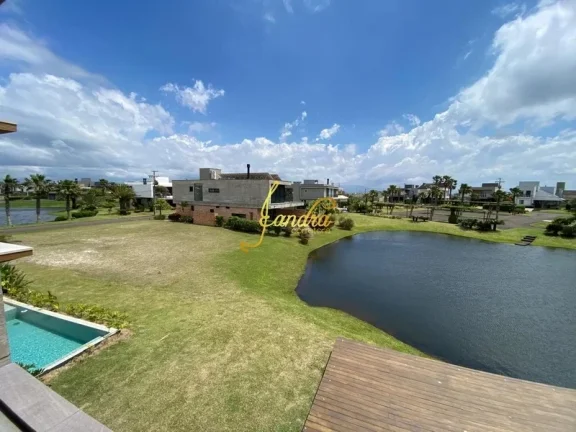 Imagem Sobrado com piscina, 06 suítes, mobiliado e decorado