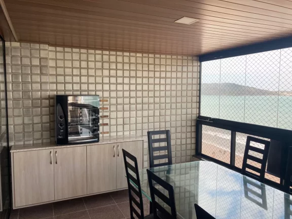 Imagem Excelente Apartamento de Frente para o Mar na Praia do Morro composto por 3 dormitório 1 sendo suíte com duas vagas de Garagens.