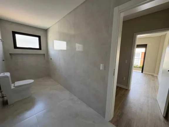 Imagem Casa de alto padrão com 4 dormitórios sendo 3 suítes e 4 vagas de garagem em Camboriú/SC