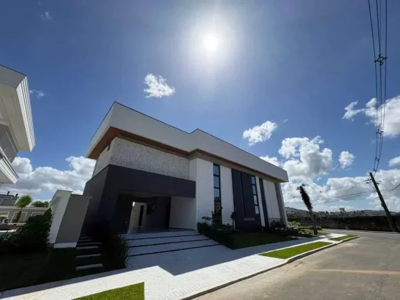Imagem Casa alto padrão em condomínio fechado, 4 suítes sendo 1 master e 4 vagas, em Camboriú/SC