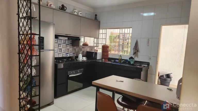 Imagem Casa à venda no Jardim Panorâmico em Patos de Minas – 3 quartos, área gourmet e garagem – R$600 mil