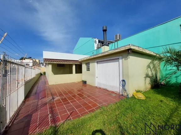 Imagem CASA DE ESQUINA NO CORAÇÃO DA AV. BORGES DE MEDEIROS