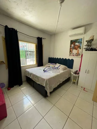 Imagem Casa com 2 dormitórios à venda, 95 m² por R$ 390.000,00 - Caiçara - Praia Grande/SP