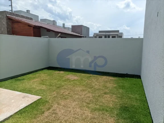 Imagem Casa geminada com 3 dormitórios no Loteamento Morada das Palmeiras em Torres/RS