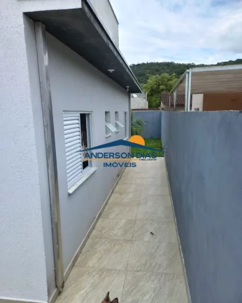 Imagem Casa com 2 dormitórios à venda, 65 m² por R$ 550.000 - Massaguaçu - Caraguatatuba/SP