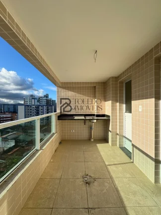 Imagem Apartamento de 2 dormitórios sendo 1 suíte, prédio frente mar no bairro Vila Mirim - Praia Grande