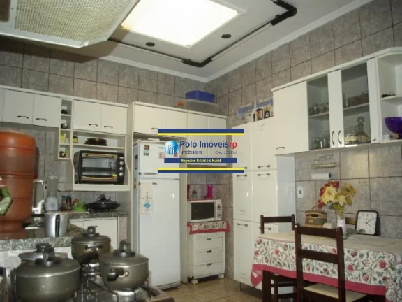 Imagem Casa bairro Campos Eliseos vende, R$ 450.000 com 3 dormitórios (1 suíte), 2 vagas, piscina - Ribeirão Preto - SP