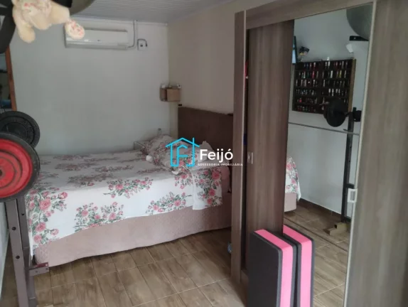 Imagem Casa 3 dormitórios com 1 suíte no Bairro Lami