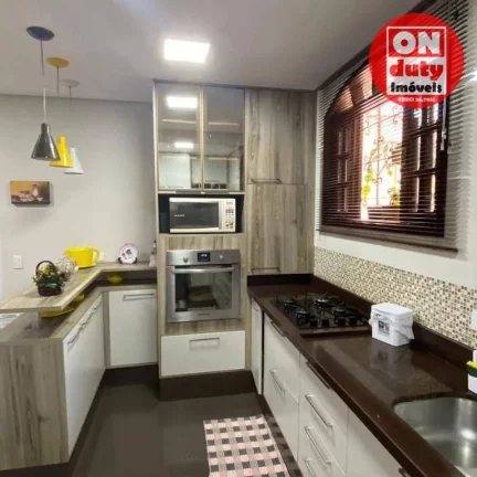 Imagem Sobrado com 3 dormitórios à venda, 200 m² por R$ 1.500.000,00 - Boqueirão - Santos/SP
