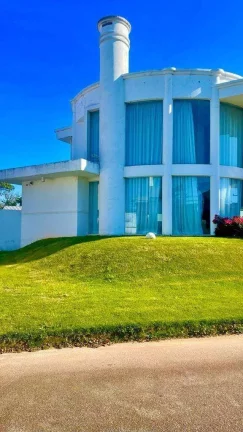 Imagem Casa à Venda, 485m2, 6 Suítes, 4 vagas, Cond. Fechado, Porto da Lagoa, Florianópolis/SC