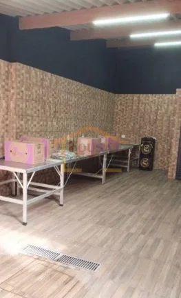 Imagem Sobrado com 250 m² de área útil, dispõe de 2 dormitórios com varanda, 1 banheiro, sala de estar...